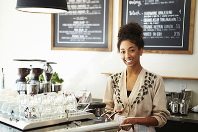 a person standing in a kitchen