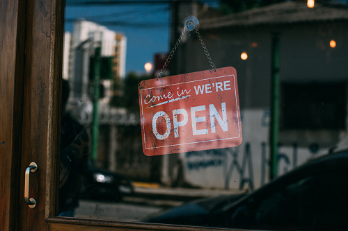 a close up of an open sign